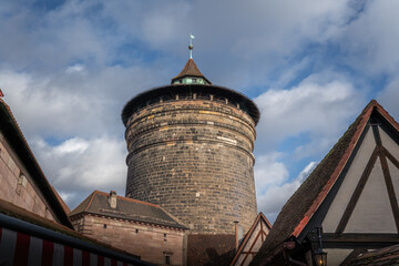 Fototapeta na wymiar Frauentorturm (Women Gate Tower) at Handwerkerhof (Craftsmens Courtyard) - Nuremberg, Bavaria, Germany