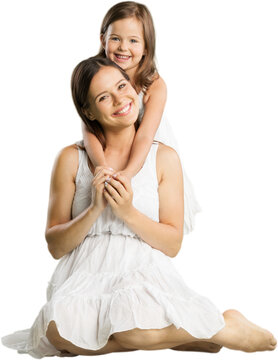 Happy mother and her daughter in white dress