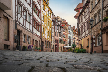 Fototapeta na wymiar Colorful traditional Half-timbered buildings at Weissgerbergasse street - Nuremberg, Bavaria, Germany