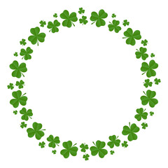 Fototapeta premium Round frame of shamrocks. Wreath made from confetti clovers