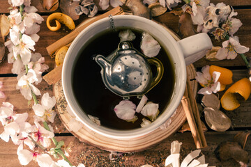 Fototapeta premium top view infusion or tea of aromatic herbs, flowers and fruits