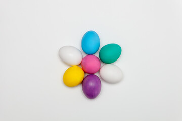 Decorated Easter eggs in the form of a flower on a white background