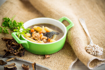 mushroom hot soup with beans in a bowl