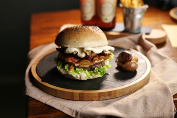 tasty beef sandwich in black background	
