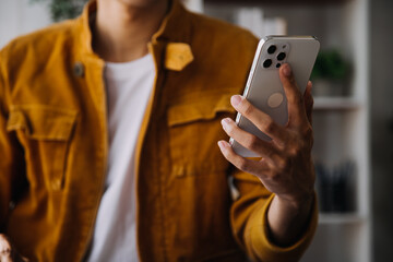 Entrepreneur Asian businessman and businesswoman discussing new business project in tablet in modern Meeting In Modern Office, Asian business casual concept.