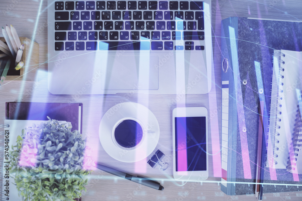 Poster double exposure of financial graph hologram over desktop with phone. top view. mobile trade platform