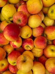 fruits as a background of many ripe apples vitamins healthy nutrition