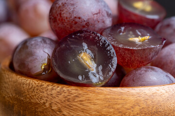 Harvested blue grapes on the table