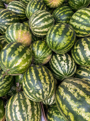lots of watermelons healthy nutrition berries as background