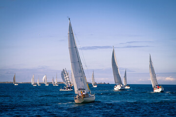 Luxury yachts Regata.Sailing in the wind through the waves at the Sea.  Isles of Scilly, Cornwall, United Kingdom. 