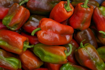 Red pepper on the counter. A large amount of red pepper, close up.