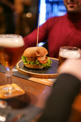 tasty beef sandwich in black background	