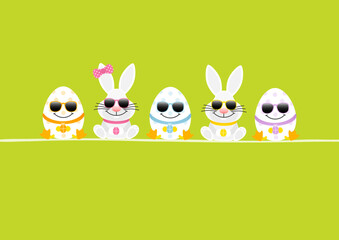 Obraz premium Sitzende Weiße Osterhasen Junge & Mädchen Mit 3 Ostereiern Sonnenbrille Karte Grün