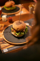 tasty beef sandwich in black background	