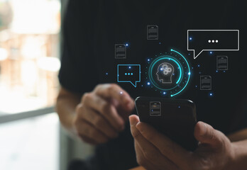 Selective focus at human hand while type or input a command to navigate chatbot or AI to get answer or information from big database. Artificial intelligence that can provide SEO or business info.