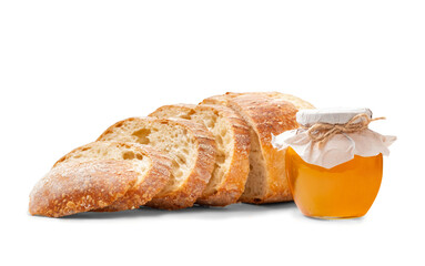Sliced bread and ? jar of honey on white background
