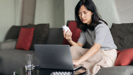 Sick asian woman with medicine having video call conference medical app in telehealth on laptop....