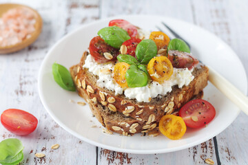Sandwiches with cherry tomatoes and cottage cheese