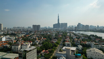 Naklejka premium Landmark81-Saigon-Vietnam Ho Chi Minh City at Light and Dark- Drone Shots-Sky shots- Sky pictures
