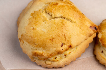 Sweet pastries made of shortbread dough and white cheese fillings