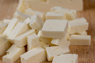 sliced soft cheese that is used for salads