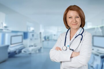 Happy young female doctor posing