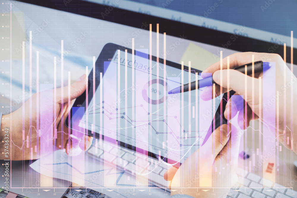 Poster double exposure of man's hands holding and using a phone and financial chart drawing. market analysi