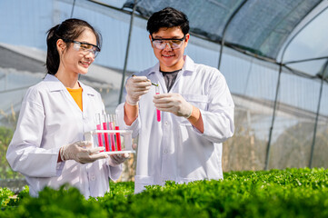 Scientists test the solution, Chemical inspection,Scientists test pH and measure carbon dioxide in...
