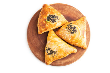 Homemade asian pastry samosa isolated on white. top view.