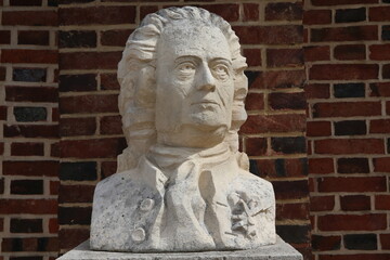 Fototapeta na wymiar 18th-century French surgeon Jacques Daviel bust in La Barre en Ouche. France.