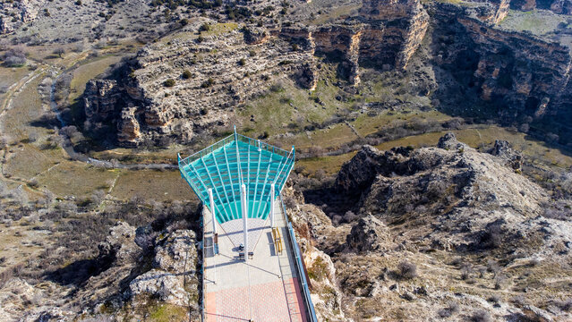 Aerial drone view of Ulubey Canyon from the glass terrace..Ulubey Canyon is the second longest canyon in the world. Ulubey, Usak, Turkey. Turkish name; Ulubey Kanyonu Cam Teras