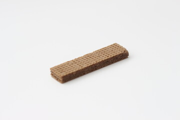 a close up of chocolate wafers isolated on white background.