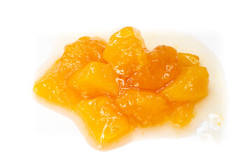 Peach jam isolated on a white background. Top view, flat lay.