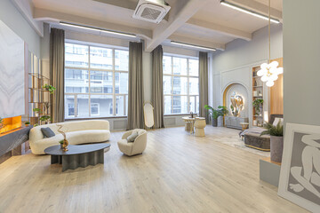 stylish luxury interior of modern studio apartment in green pastel colors with wooden elements. expensive furniture and decorations