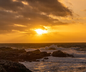 Rough seas at sunset on the Isle of Anglesey