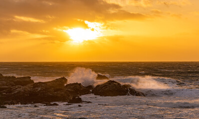 Rough seas at sunset on the Isle of Anglesey