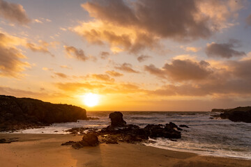 Fototapeta na wymiar Rough seas at sunset on the Isle of Anglesey