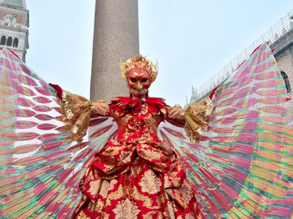 Person dressed up for Carnival of Venice wearing Fenix costume