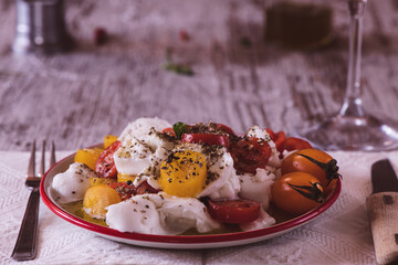 Caprese salad on a rustic table