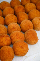 Traditional street food in UK, stuffed fried Scotch eggs with breadcrumbs