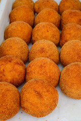 Traditional street food in UK, stuffed fried Scotch eggs with breadcrumbs