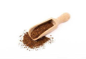 Soluble coffee grains in a wooden spoon isolated on a white background.