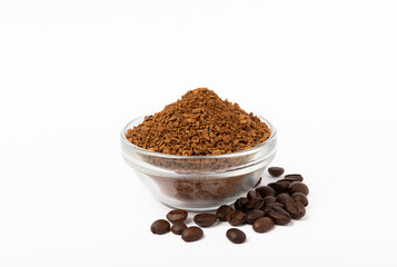 Instant coffee grains in a glass bowl isolated on white background.