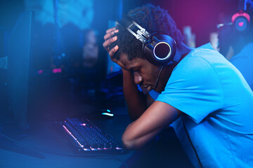 Professional American African gamer upset, because losing games of tournaments esport online video,...