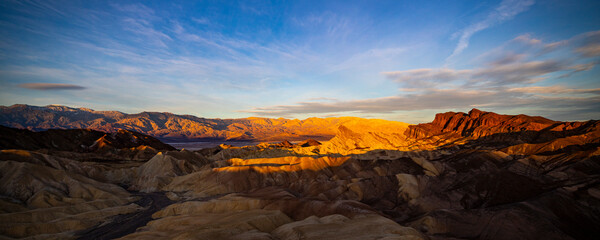 Obraz na płótnie Canvas colorful sunrise in zabriskie point, death valley national park, california, usa; colorful mountains on the desert