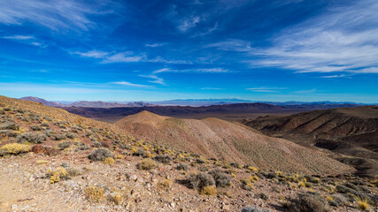 panorama of death valley national park seen from dante's view peak lookout; famous desert in california during spring