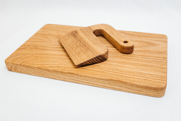 Сhildren's wooden knife on cutting board	