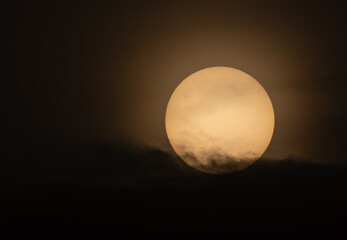 The sun slowly hides in the misty sunset!