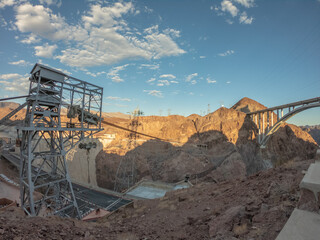 Hoover Dam is a concrete arch-gravity dam in the Black Canyon of the Colorado River, on the border between the U.S. states of Nevada and Arizona.
