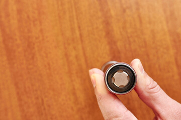 Batteries are inserted into the electronic device. View from above. The concept of powering...